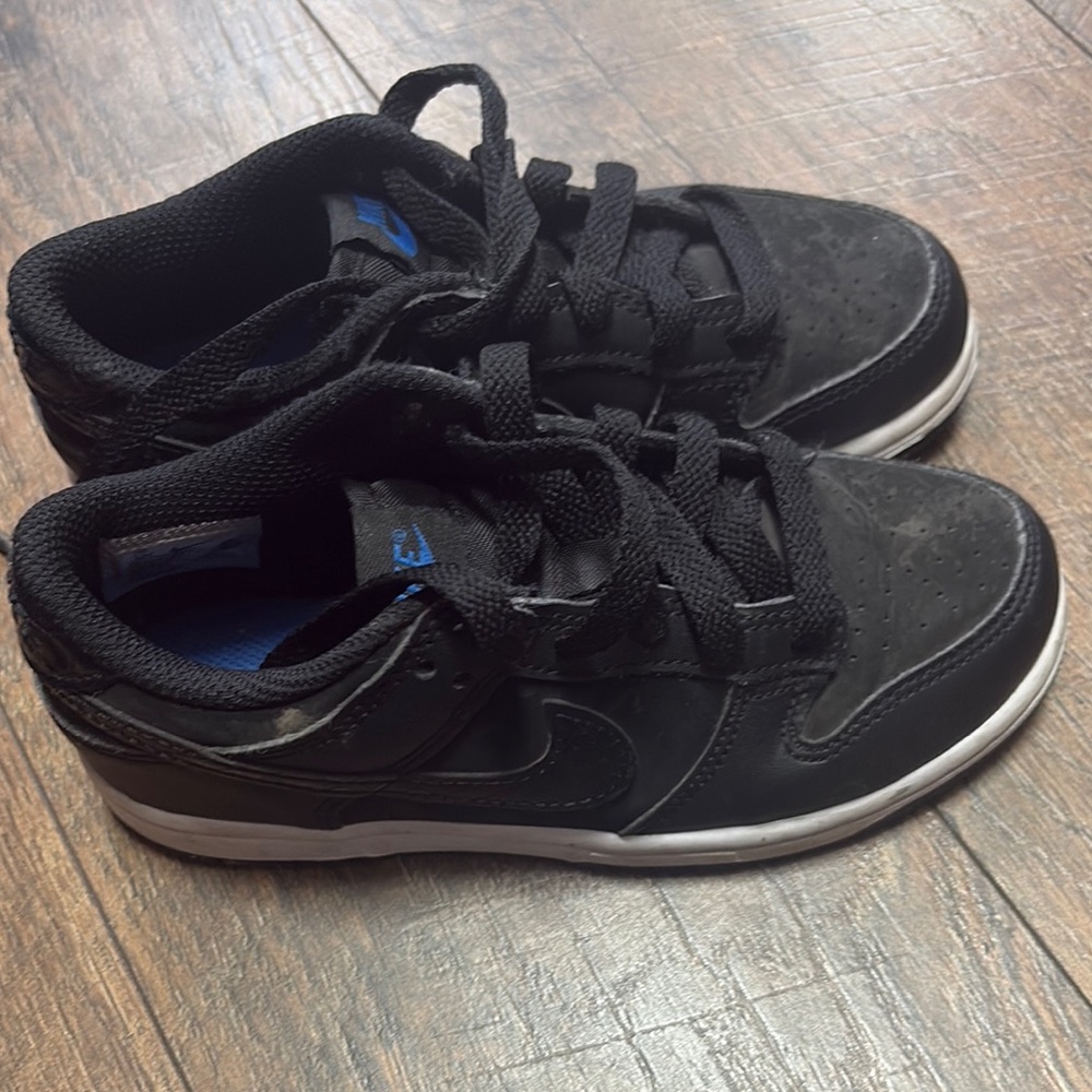 Nike kid’s Black Sneakers with Blue Highlights